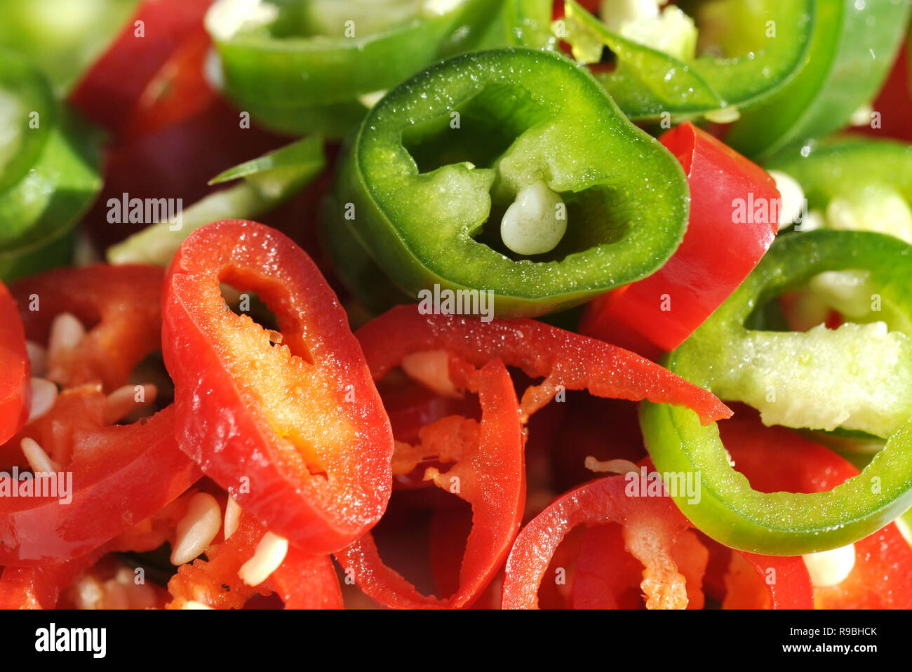 Closeup on red and green chopped chili Stock Photo