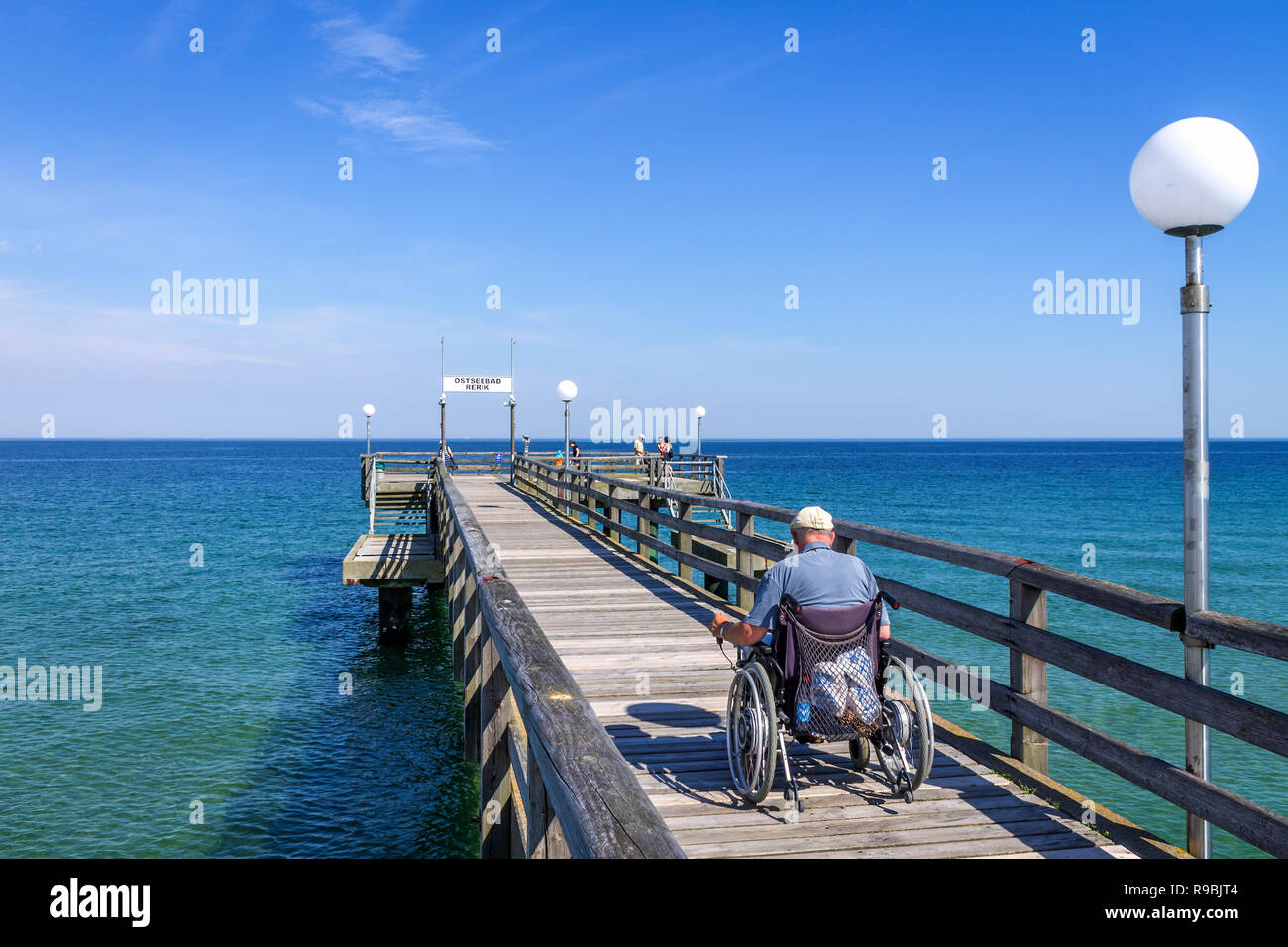 Wheel Chair on vacation, Rerik, Germany Stock Photo