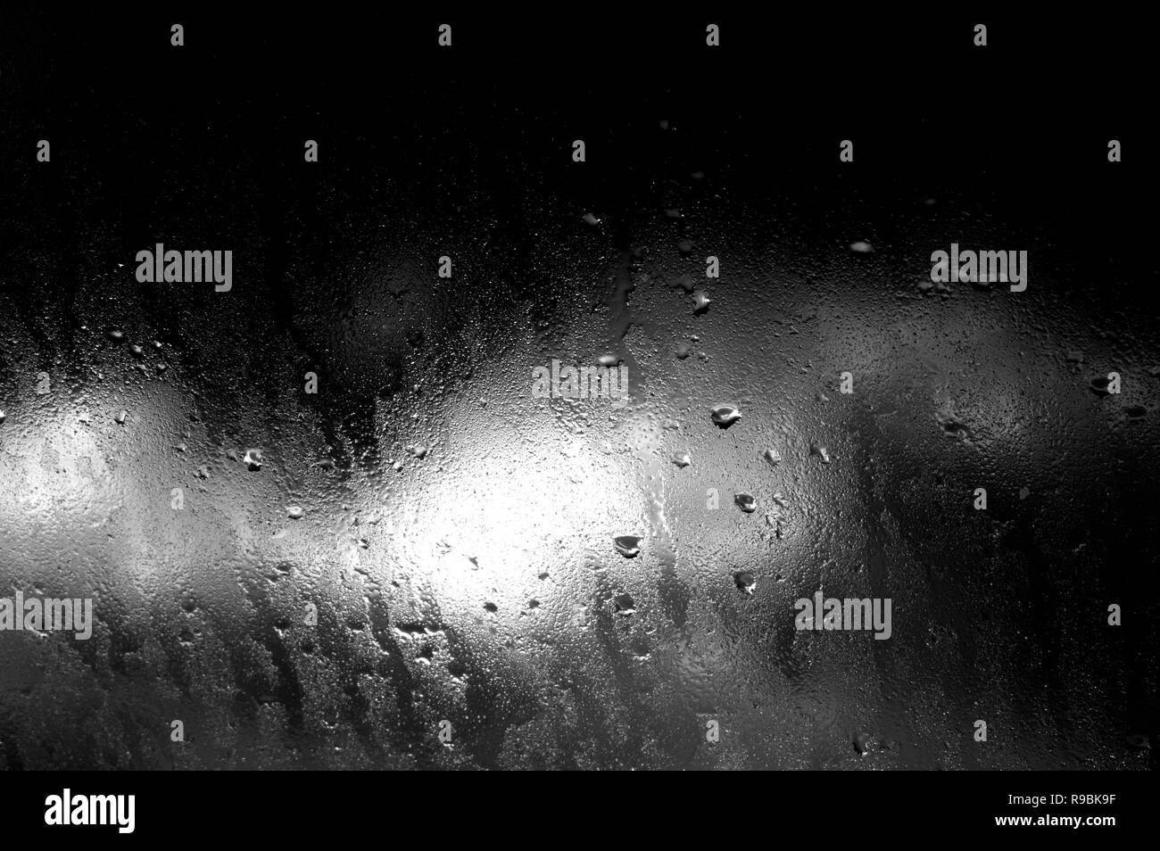 Rain drops on window glasses surface with cloudy background Stock Photo ...