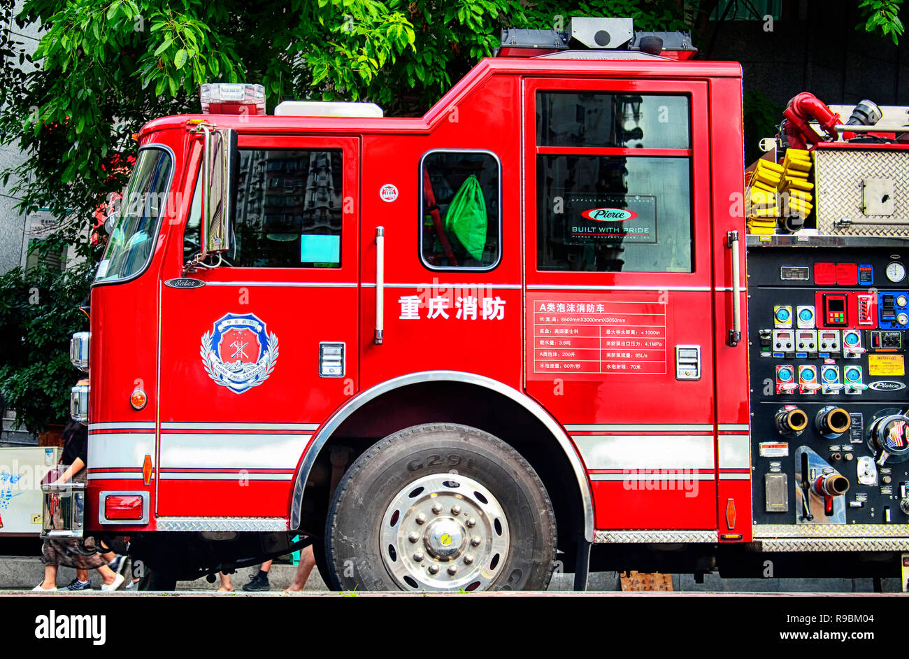 Chongqing, China.  June 23, 2018. A red China fire services truck parked outside of Arhat Temple in Yuzhong District of Chongqing China. Stock Photo