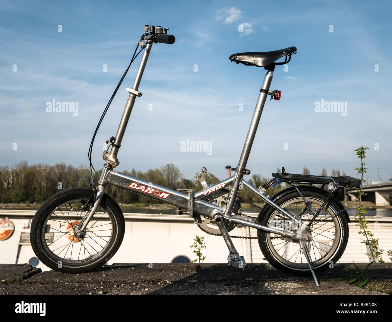 Dahon Presto folding bike with Brooks Flyer saddle and Schwalbe tyres, Warsaw, Poland Stock Photo