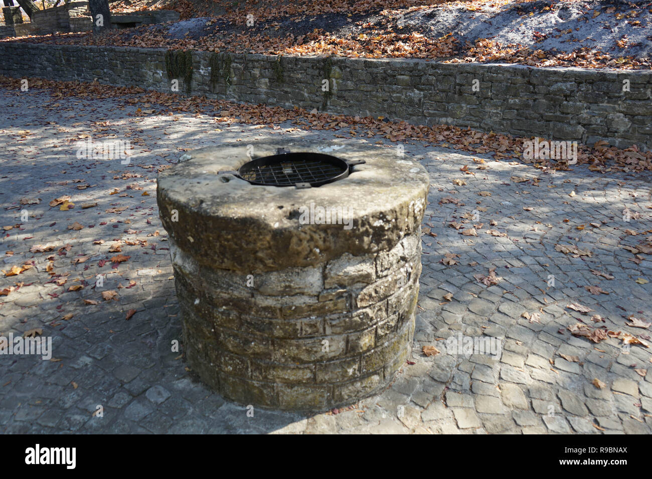 Murazzano, a old dug well for the whater Stock Photo