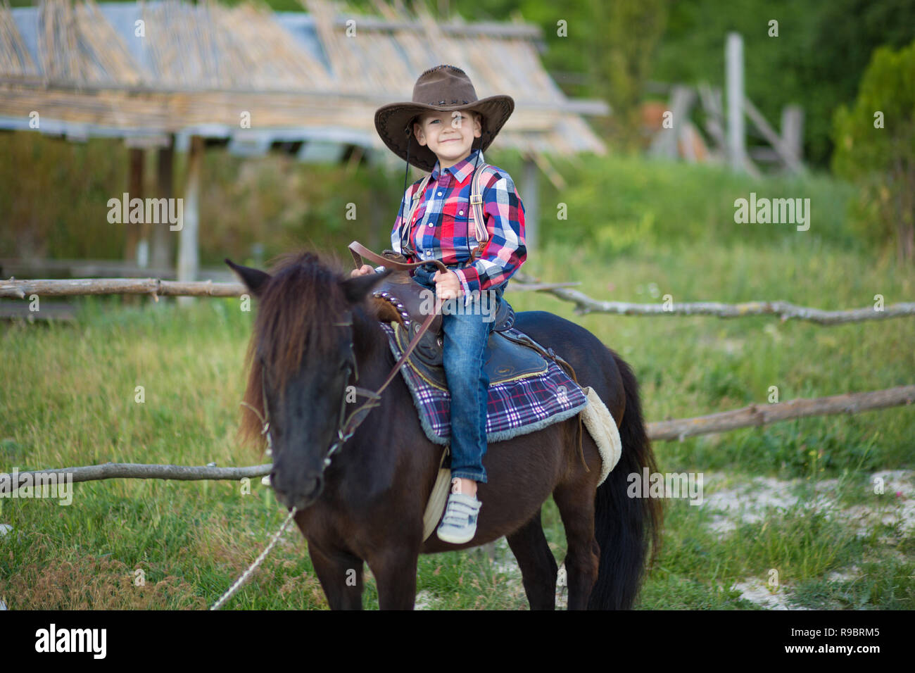 Cute fermer handsome boy cowboy in 