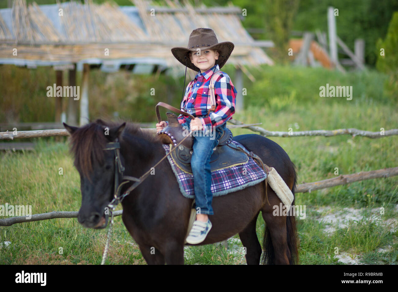 Cute fermer handsome boy cowboy in 