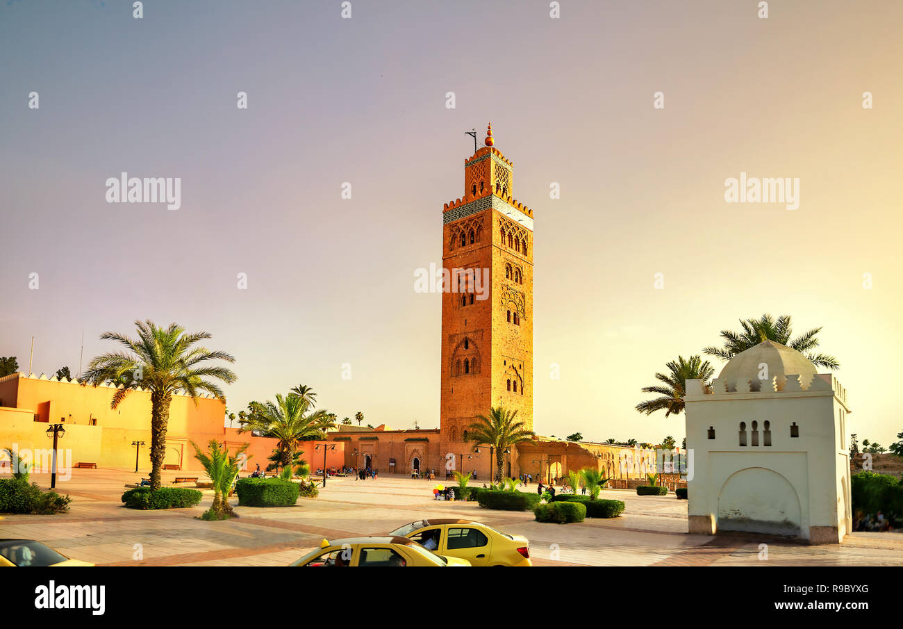 View of largest and oldest mosque with minaret Koutoubia, (Kutubiyya Mosque) in Marrakesh at sunset. Morocco, North Africa Stock Photo