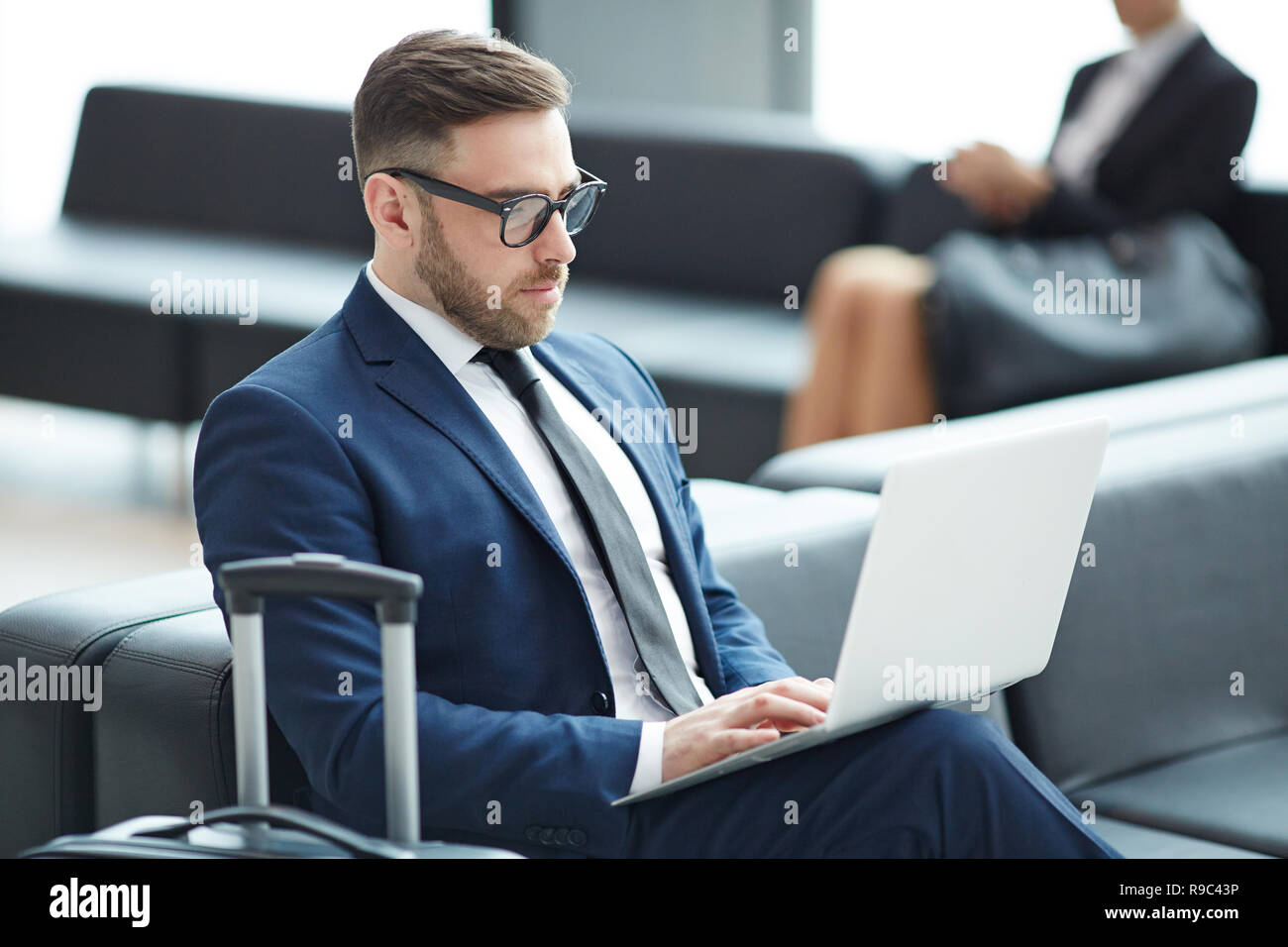 Using wi-fi in airport Stock Photo
