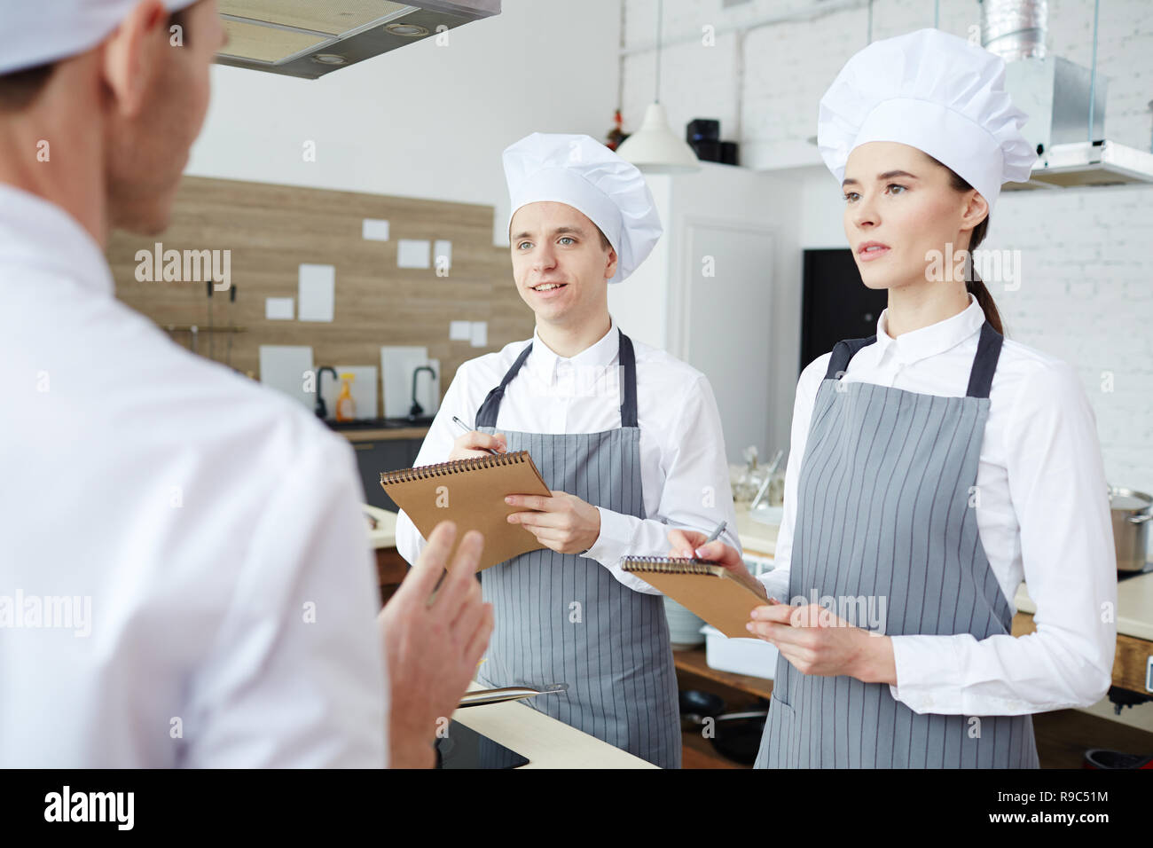 Trainees making notes Stock Photo
