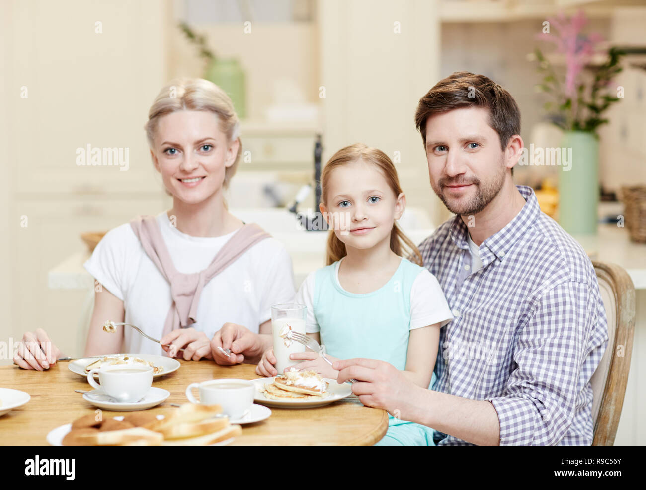 Family Table Resevers Family by served table Stock Photo - Alamy