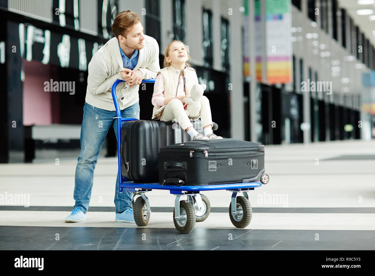 Baggage and daughter Stock Photo Alamy