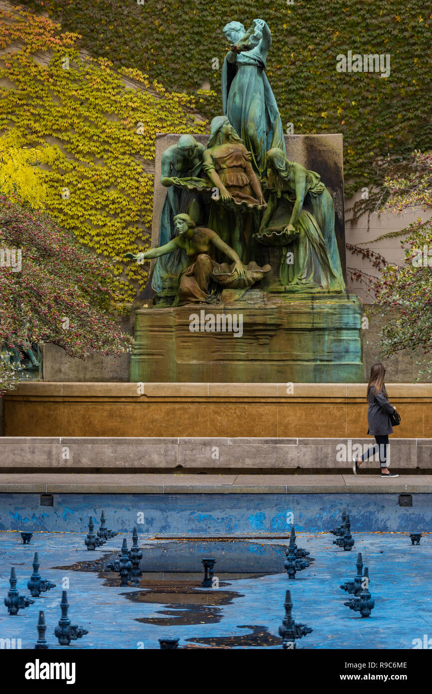 'Spirit of the Great Lakes Fountain' by Lorado Taft in the sculpture garden of the Art Institute of Chicago sculpture, in autumn. Stock Photo
