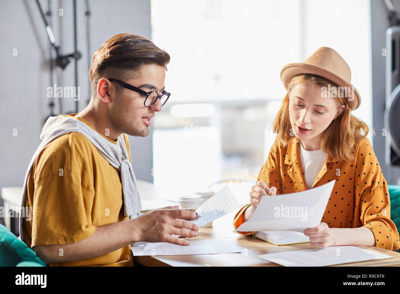 Colleagues discussing papers Stock Photo