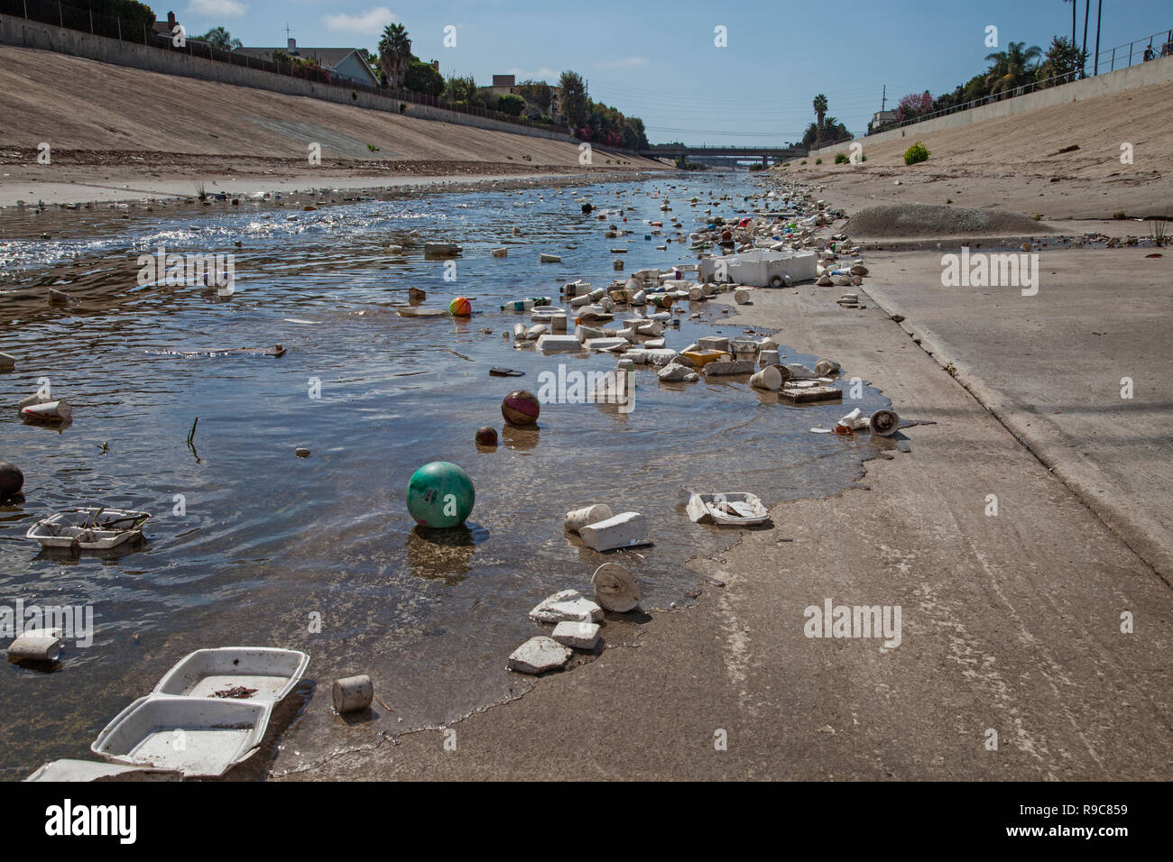 Large amounts of trash and plastic refuse collect in Ballona Creek after first major rain storm of the season. Ballona Creek. Once a meandering creek, Stock Photo