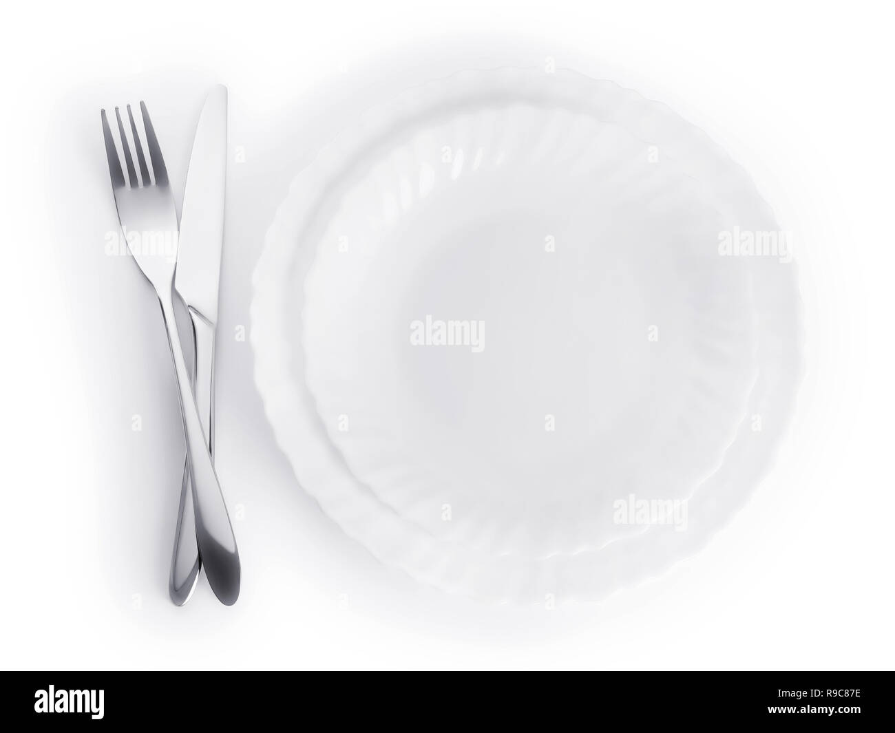 Place setting. Fork, knife and plates isolated on white. Top view