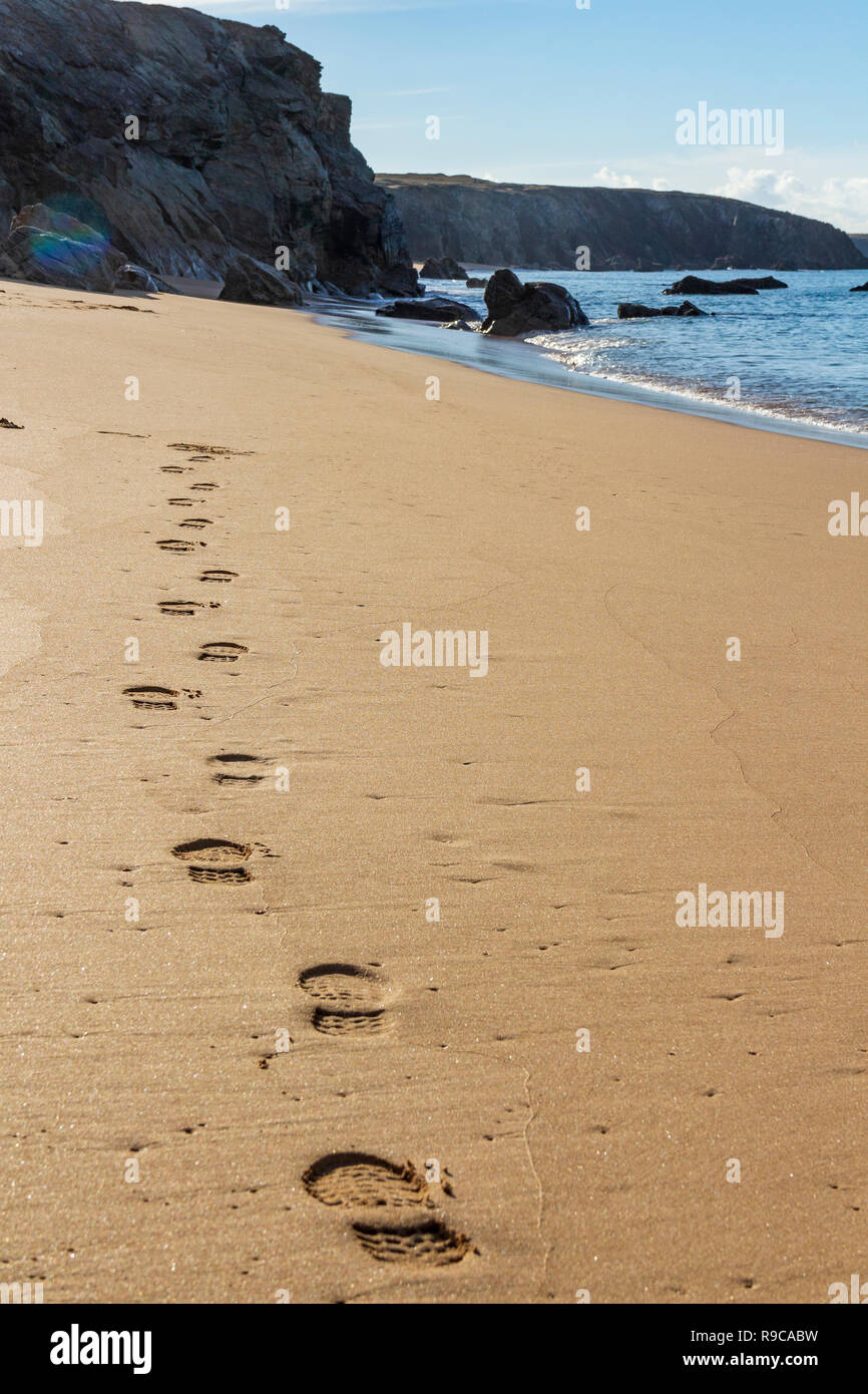 Foodsteps on the beach Stock Photo