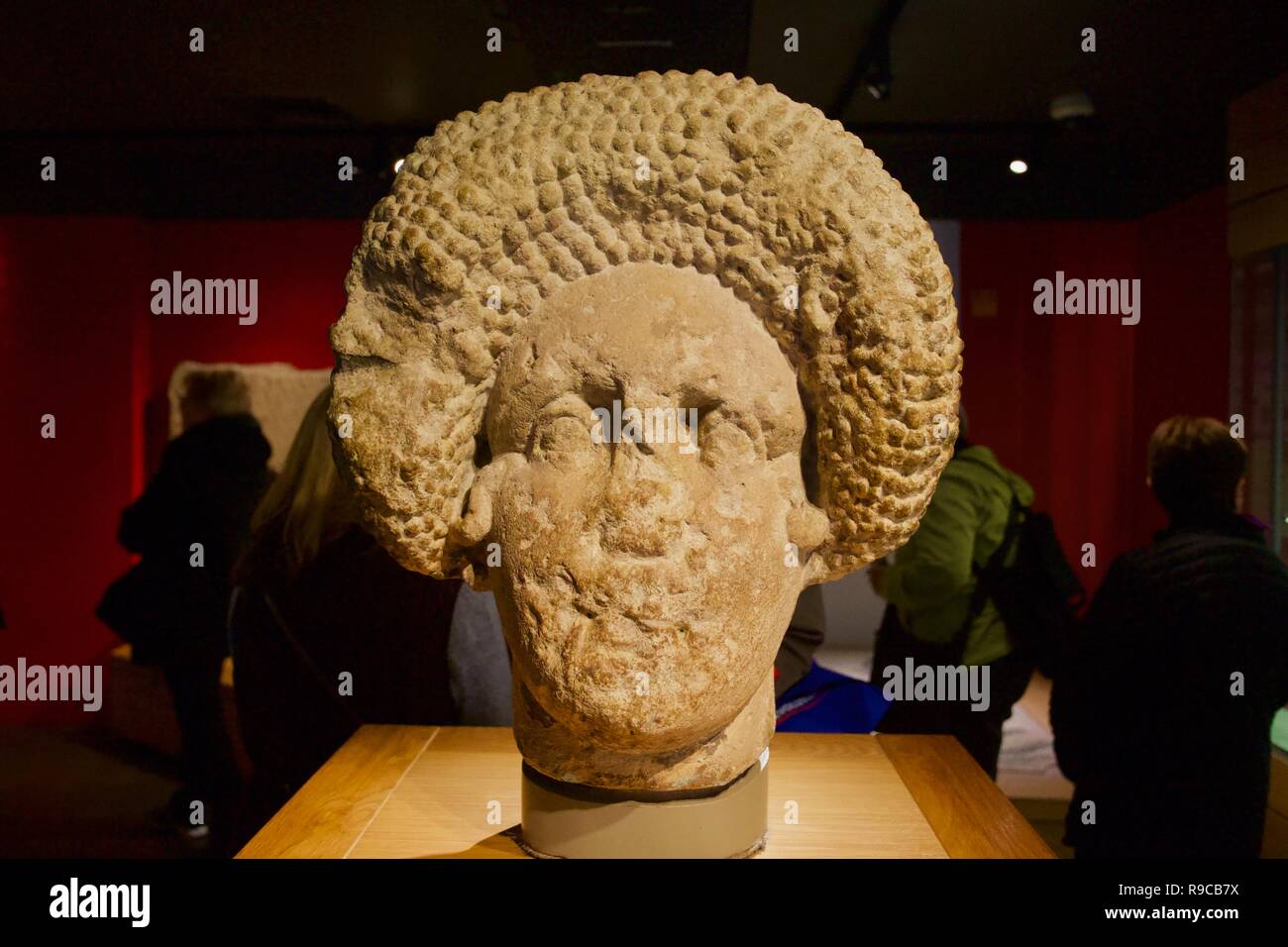 The carved stone head of a roman woman, Roman Baths, Bath,Somerset