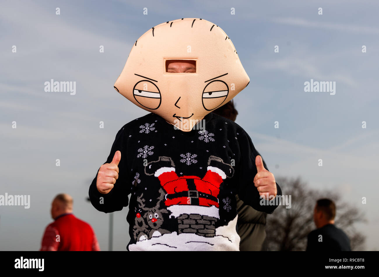Sean Dyson wearing his Family Guy festive fancy dress outfit arrives before the start of the day's play during day ten of the William Hill World Darts Championships at Alexandra Palace, London. Stock Photo