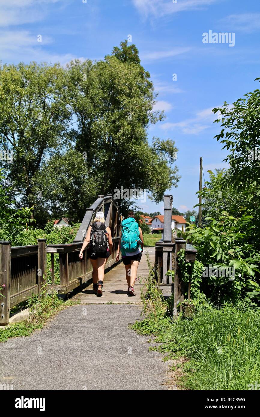 Hikers crossing bridge hi-res stock photography and images - Alamy