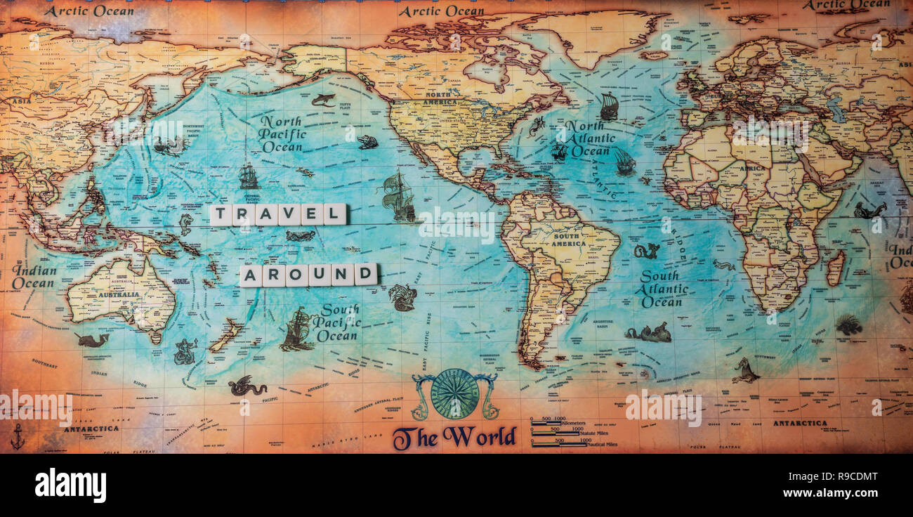 Travel Around, travel quote on world map Stock Photo