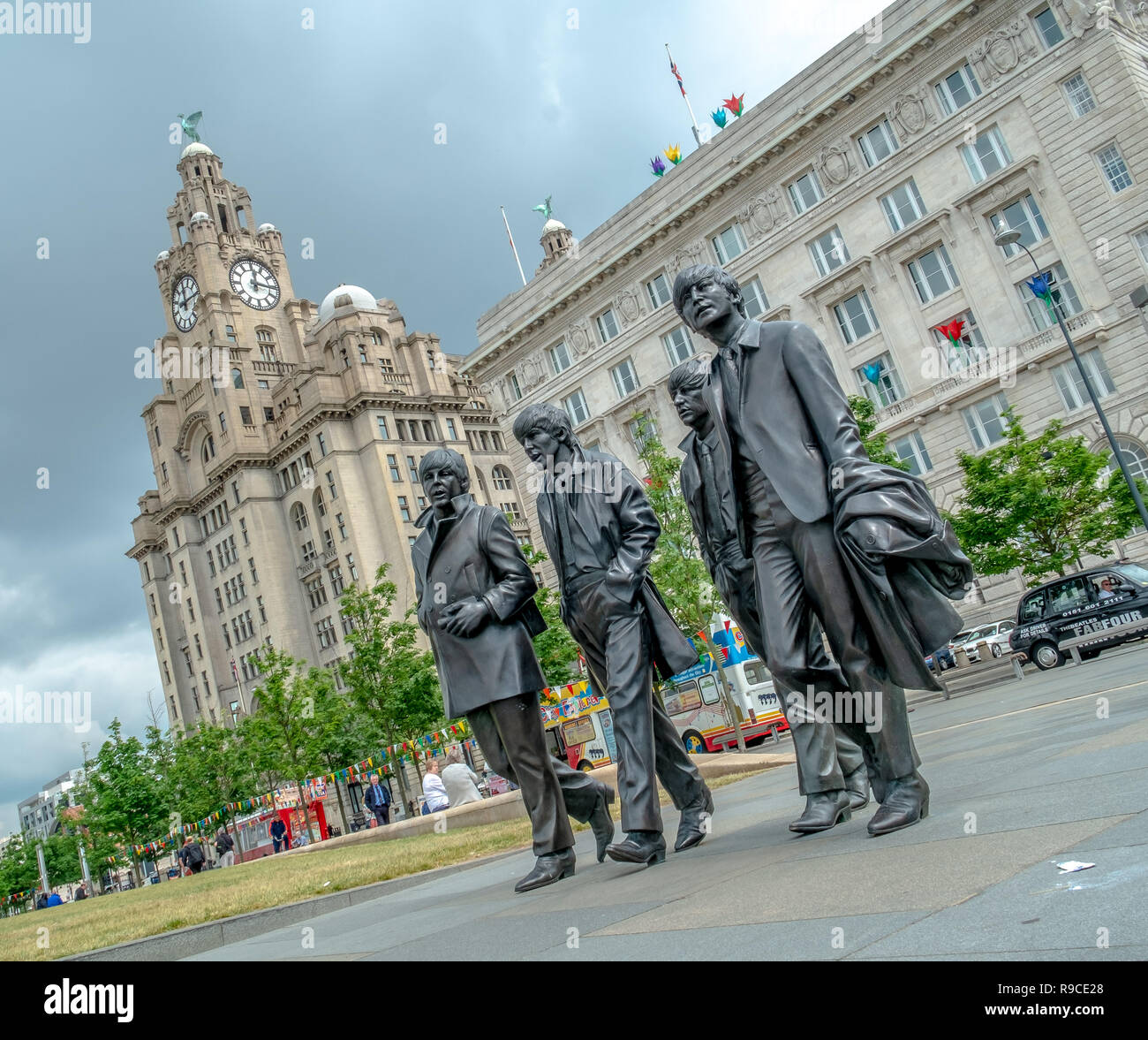 Sculpture of the Beatles at the waterfront in Liverpool by the Mersey River Stock Photo