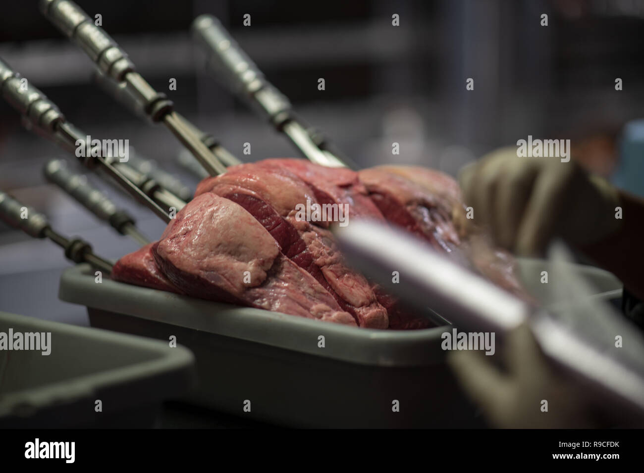 Meat being prepared for restaurant Stock Photo