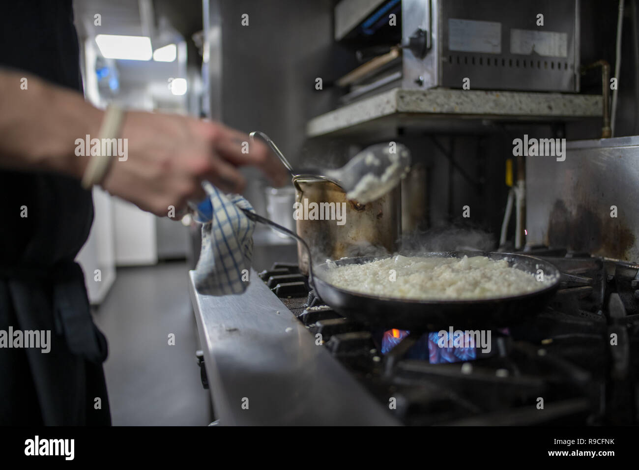 Rice cooking in a pan Stock Photo Alamy