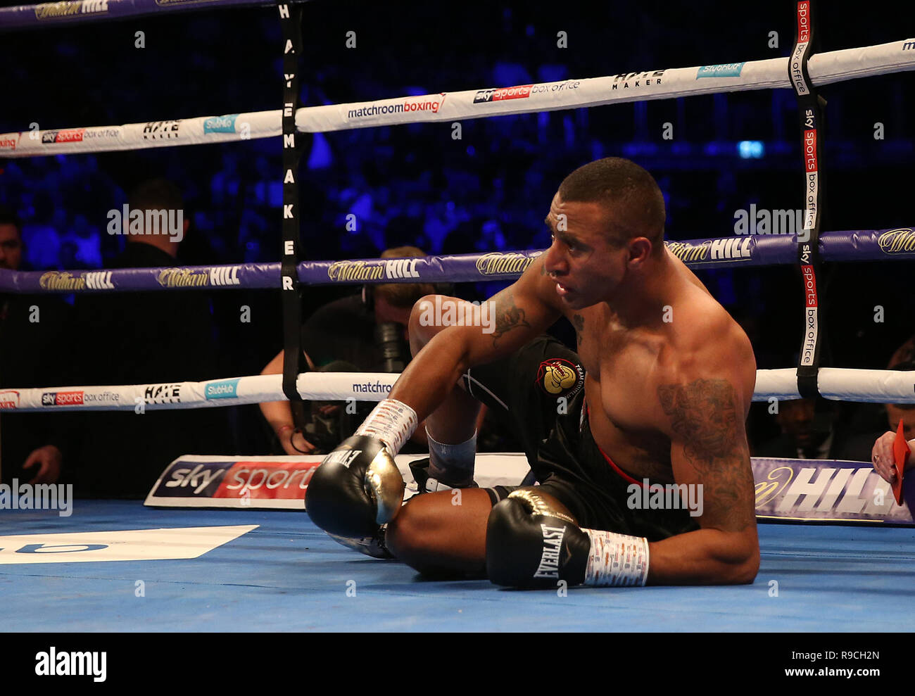 Referee stops the fight in the first round for Renold Quinlan during the WBA International Light-Heavyweight Championship at the O2 Arena, London. Stock Photo