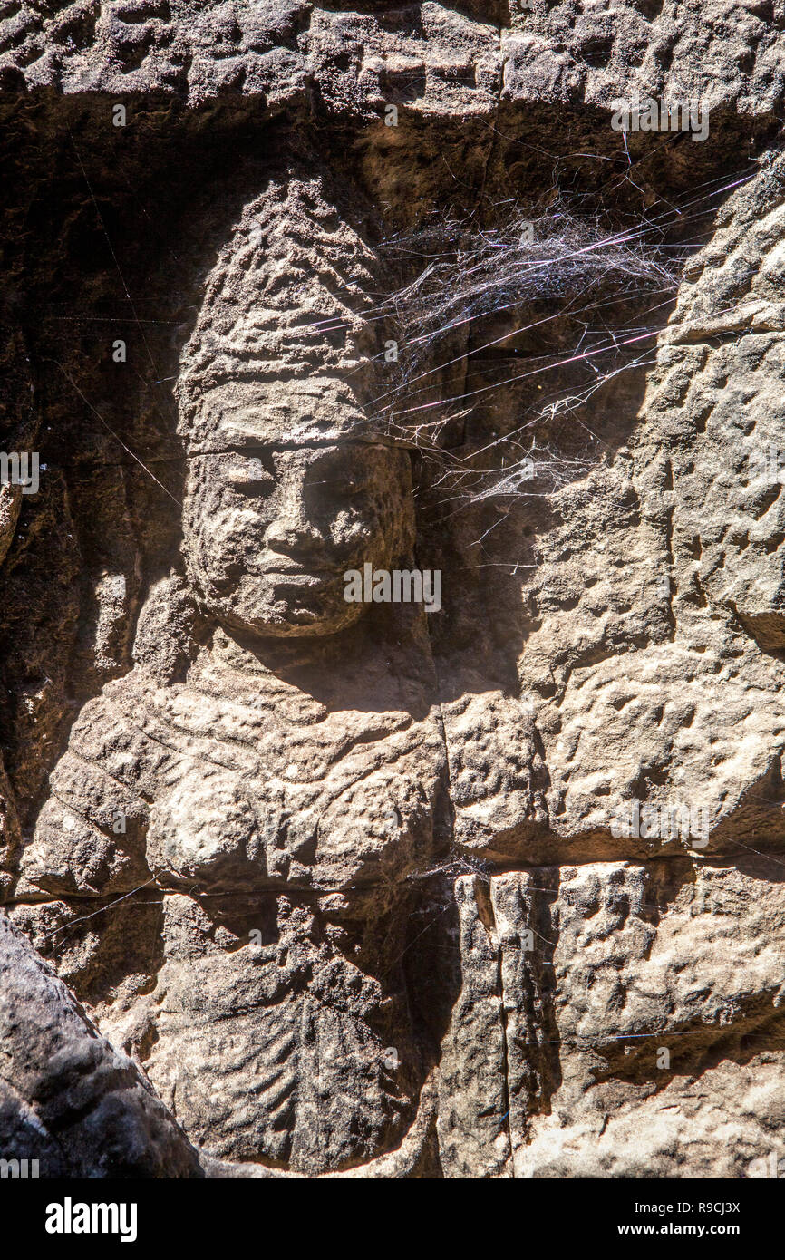 Sandstone bas-relief carvings at Angkor Thom Terrace of Elephants in Siem Reap, Cambodia. Stock Photo