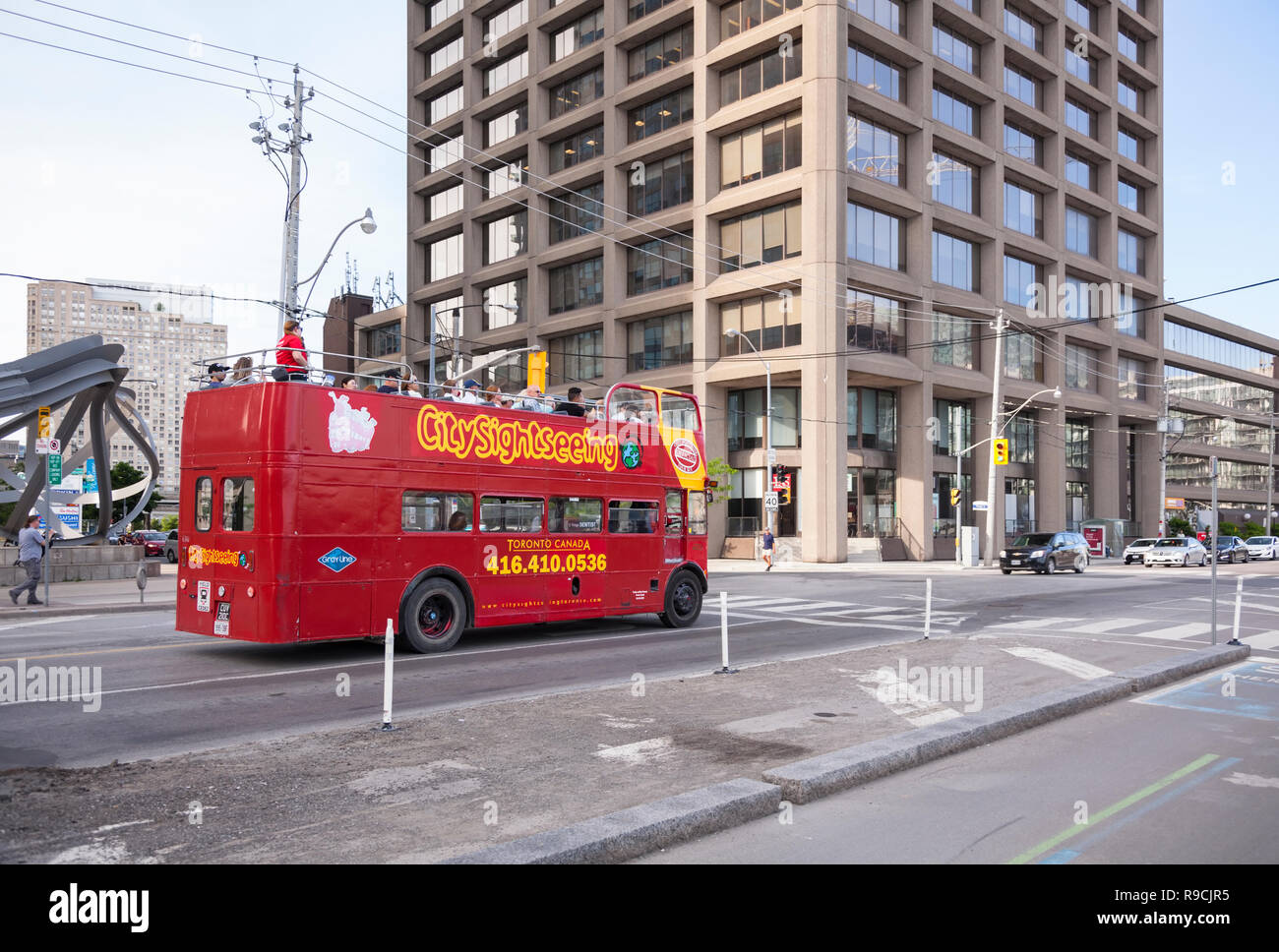 A City Sightseeing Toronto tour bus along Queens Quay. City of Toronto, Ontario, Canada. Stock Photo