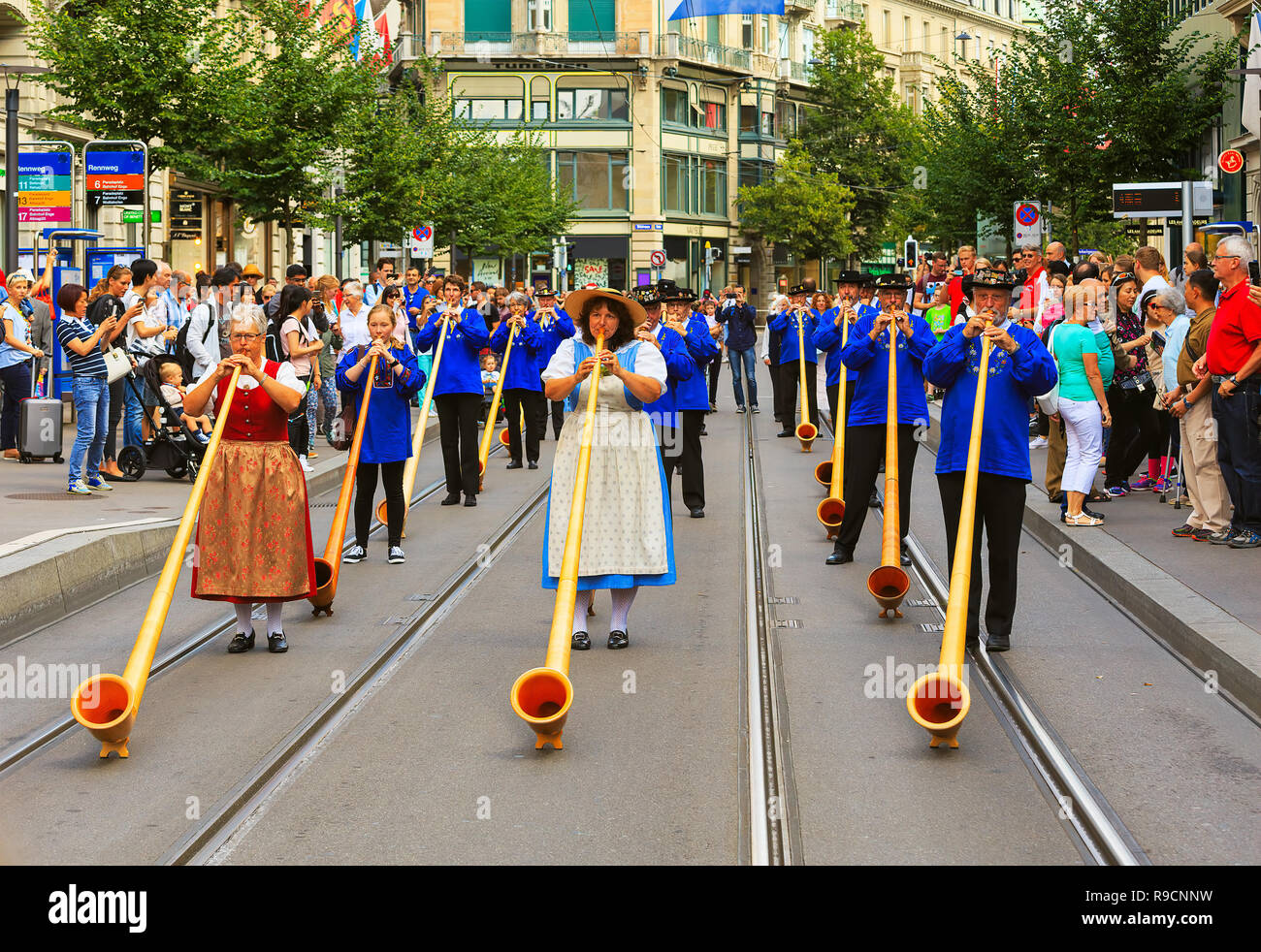 Zurich, Switzerland - August 1, 2016: participants of the parade devoted to the Swiss National Day passing along Bahnhofstrasse street. The Swiss Nati Stock Photo