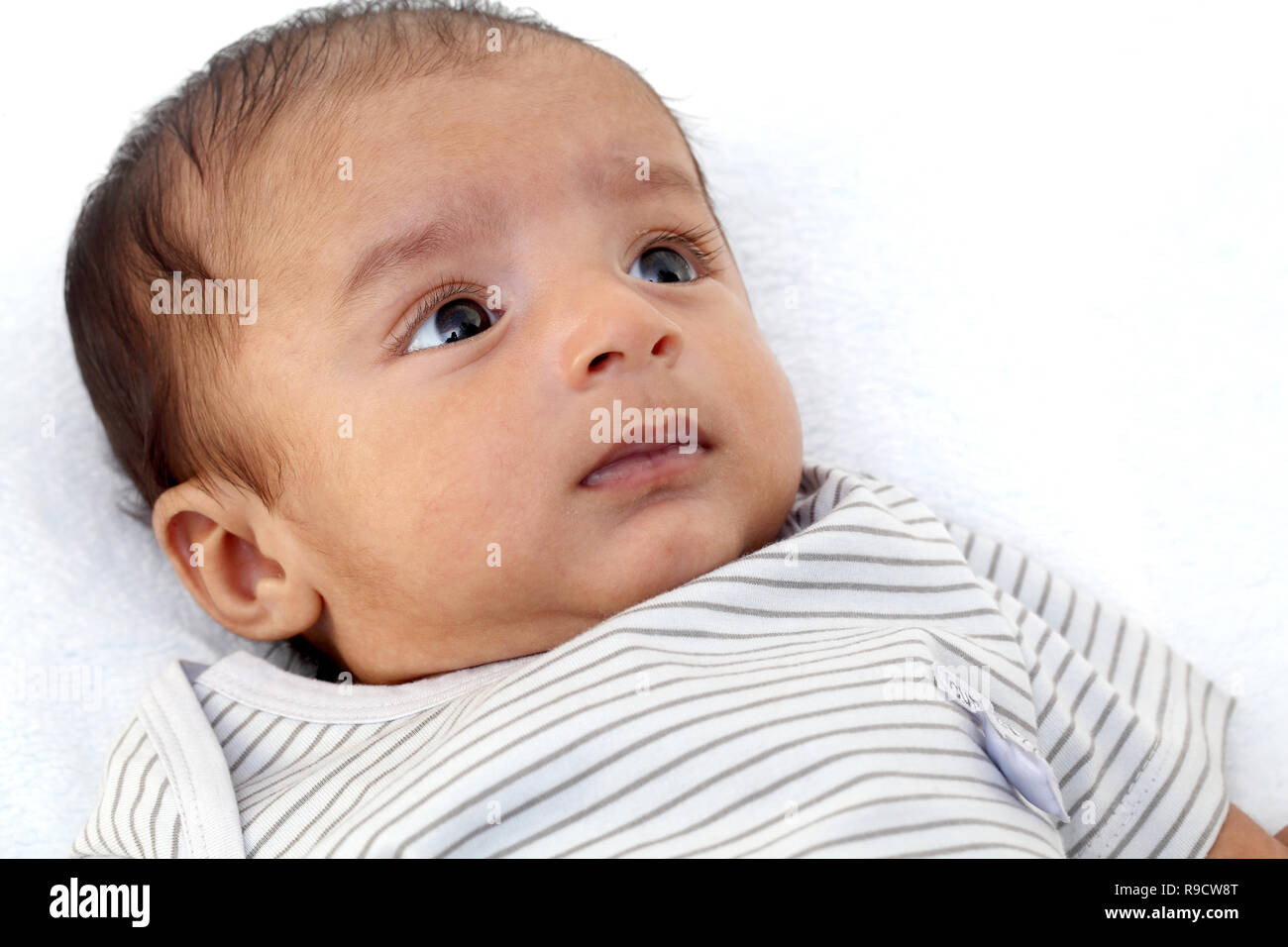 Cheerful Indian newborn baby close up Stock Photo