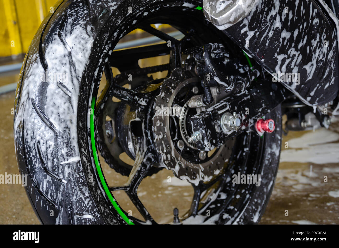Wash motorcycle with foam Stock Photo Alamy