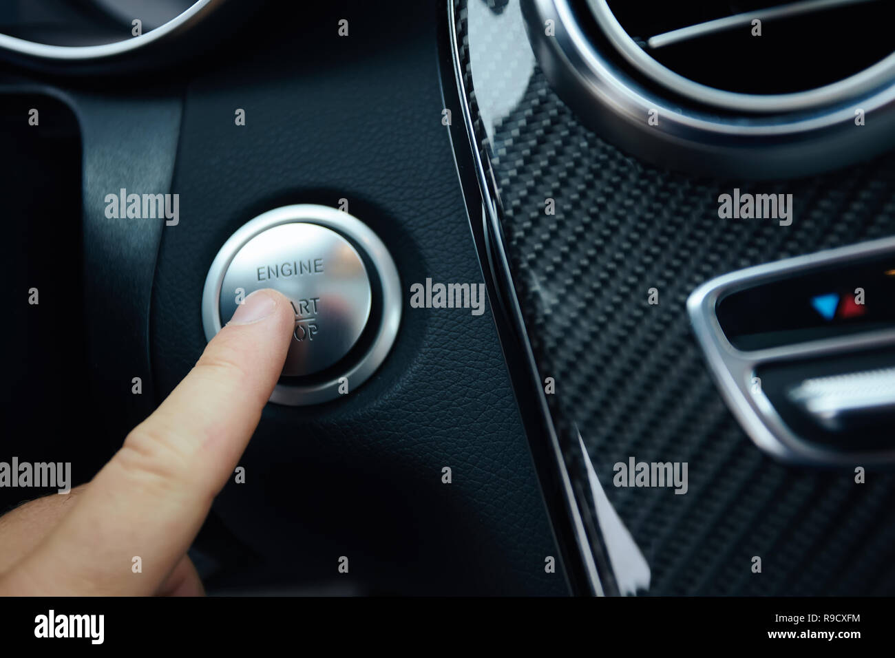 Car driver starting the engine. Shallow dof Stock Photo - Alamy