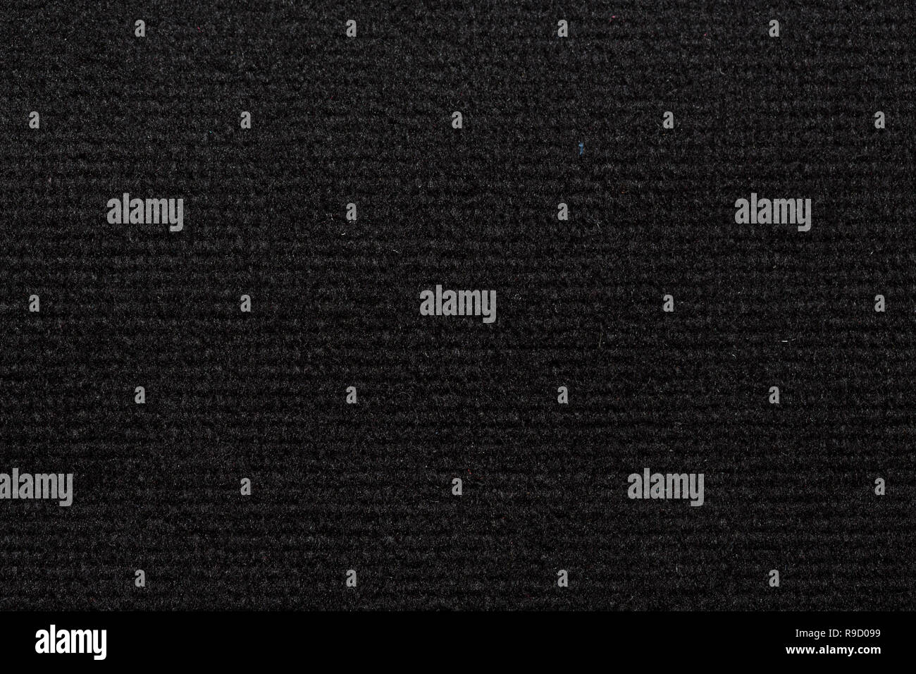 Classic textile background in dark colour on macro. Stock Photo