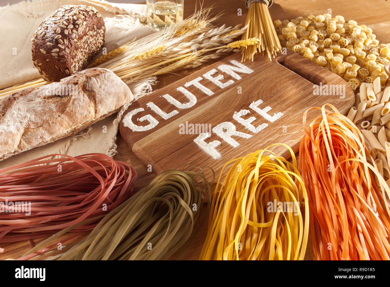 Gluten free food. Various pasta, bread and snacks on wooden background from top view. Healthy and diet concept. Stock Photo
