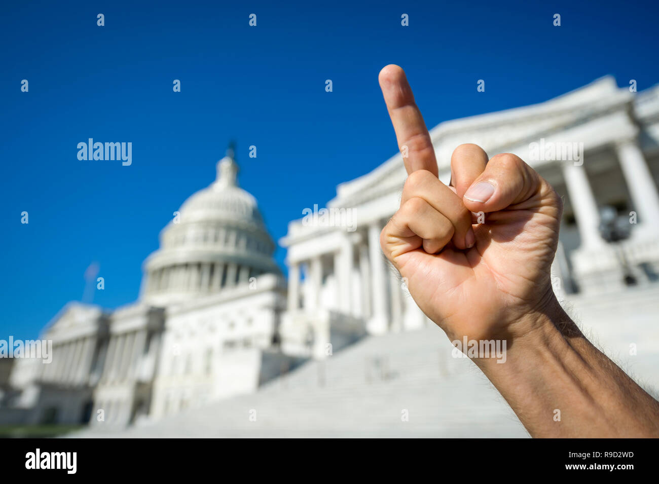Hand of protestor making strong gesture at the Capitol Building in Washington DC, USA Stock Photo