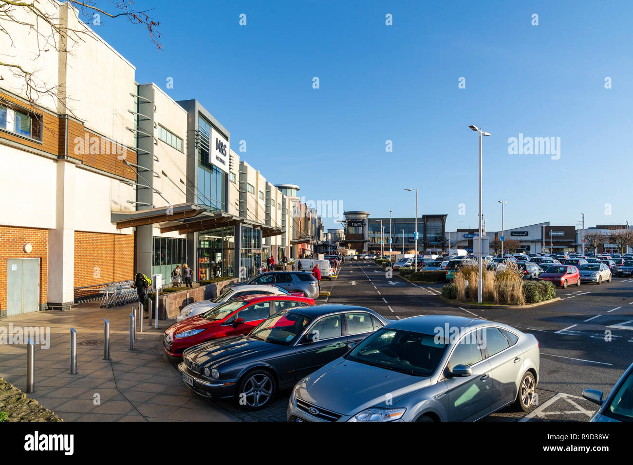 Westwood Cross shopping centre, England. Car park packed with cars, M&S
