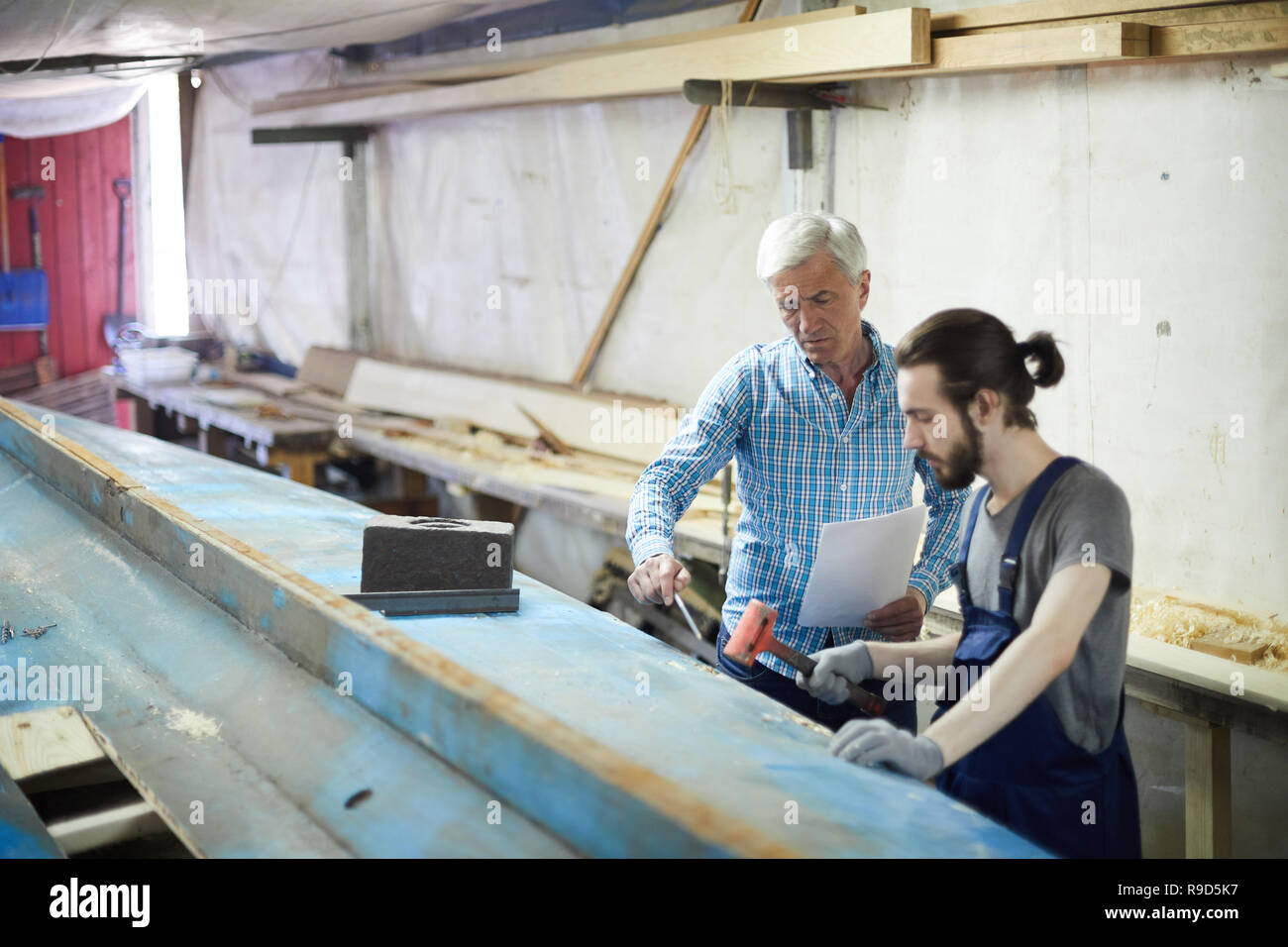 Instructed Person Instructing hi-res stock photography and images - Alamy
