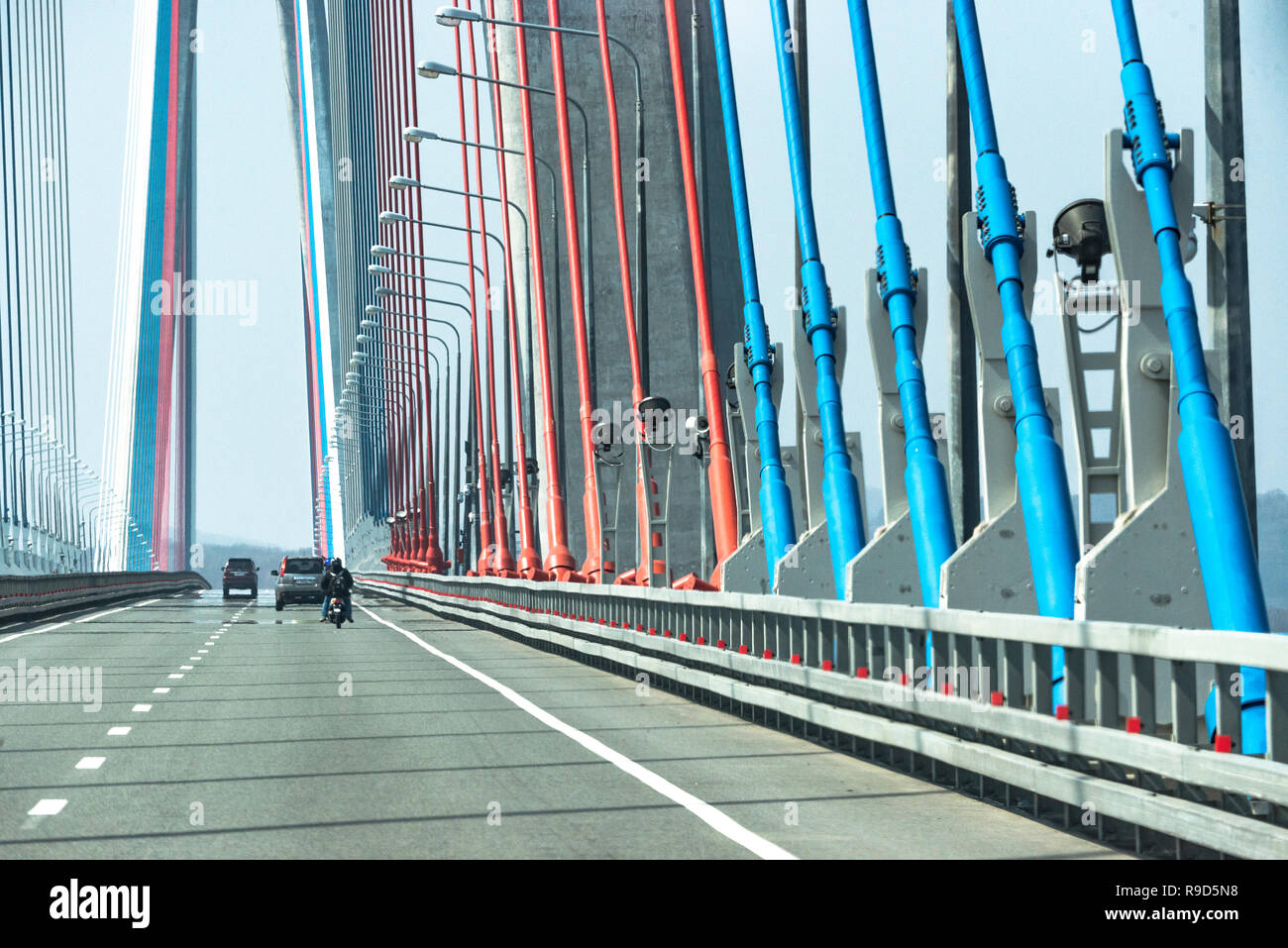 Russky Bridge across the Eastern Bosphorus strait links the mainland and Russky Island, Vladivostok, Russia. 26 Apr 2015. Stock Photo