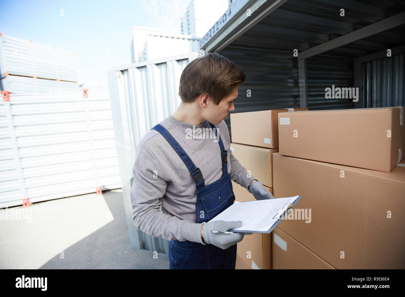 Warehouse manager distribution boxes hi-res stock photography and ...