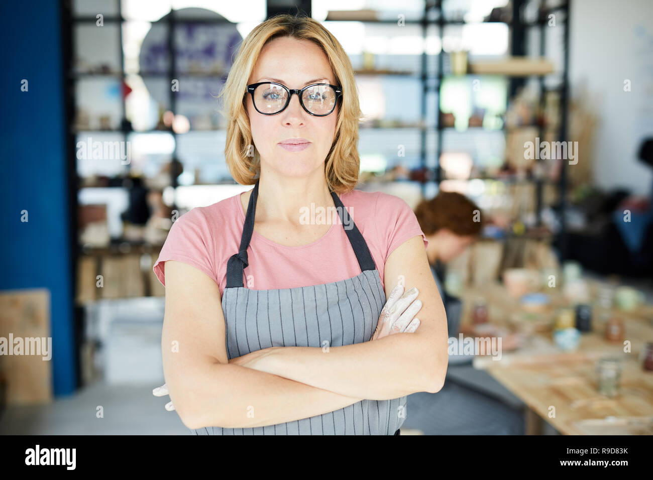 Woman in pottery workshop Stock Photo
