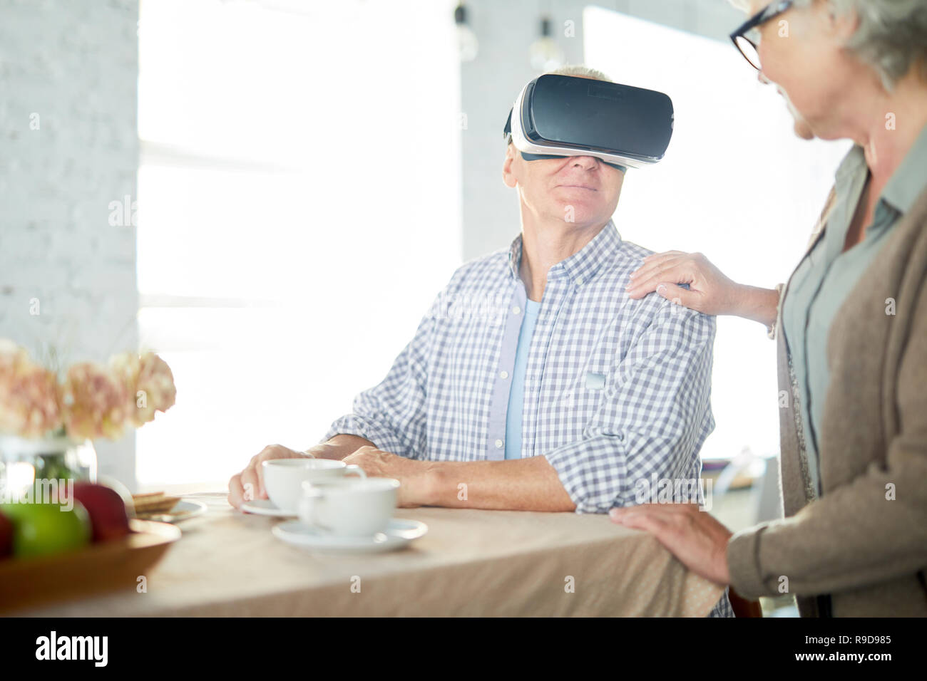 Breakfast in virtual reality Stock Photo
