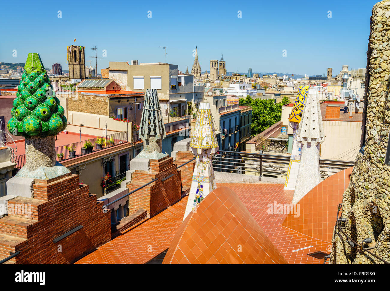 Barcelona, Spain, April 21, 2017: Rooftop view from Palau Guell feturing decorative sculptures by Antoni Gaudi Stock Photo