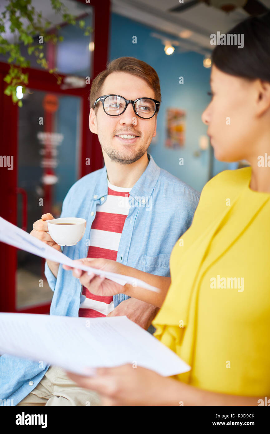 Man woman discussing business documents hi-res stock photography and ...