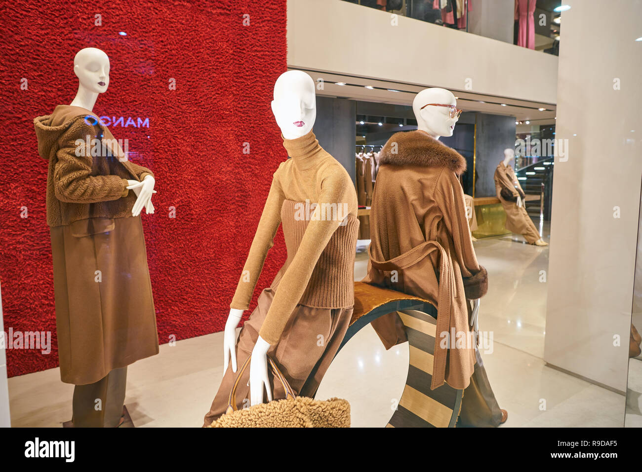 MILAN, ITALY - CIRCA NOVEMBER, 2017: shop window display of clothing at MaxMara store in Milan, Italy. Stock Photo