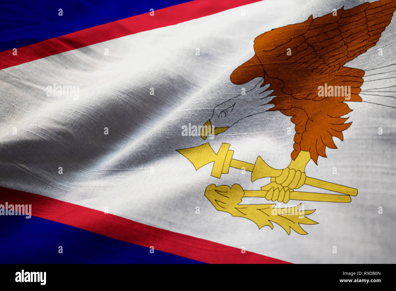 Closeup of Ruffled American Samoa Flag, American Samoa Flag Blowing in Wind Stock Photo