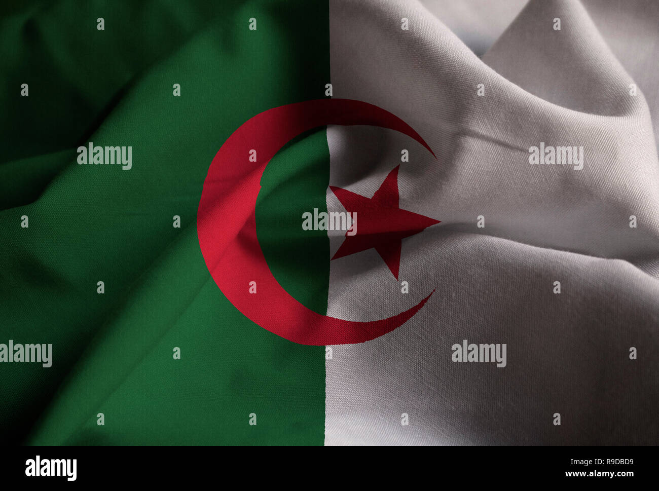 Closeup of Ruffled Algeria Flag, Algeria Flag Blowing in Wind Stock Photo