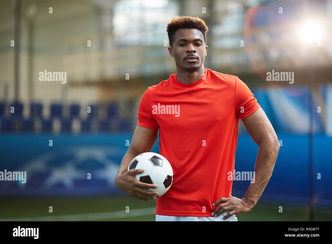Footballer at stadium Stock Photo