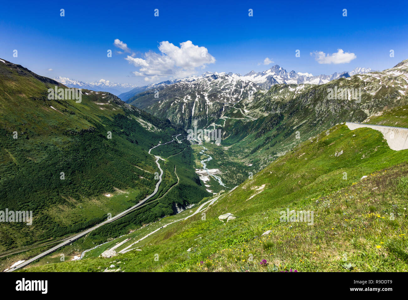 Rhone Valley at canton Valais with the to road to Furka pass on the left an the road to Grimsel pass on the background, Switzerland Stock Photo