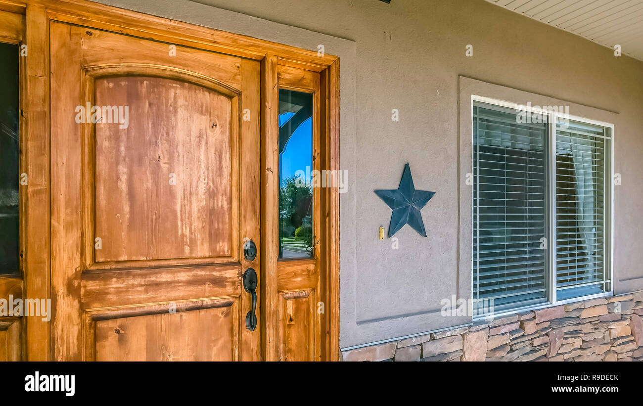 Rustic Wooden Front Door With Glass Panes Of Home Stock