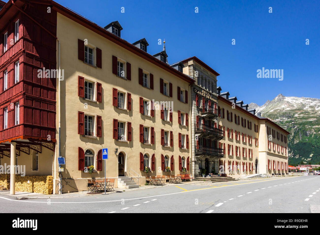 Traditional Swiss vintage Hotel Galcier du Rhone on the road of Furka Pass. Gletsch, Valais, Switzerland, July 2018 Stock Photo